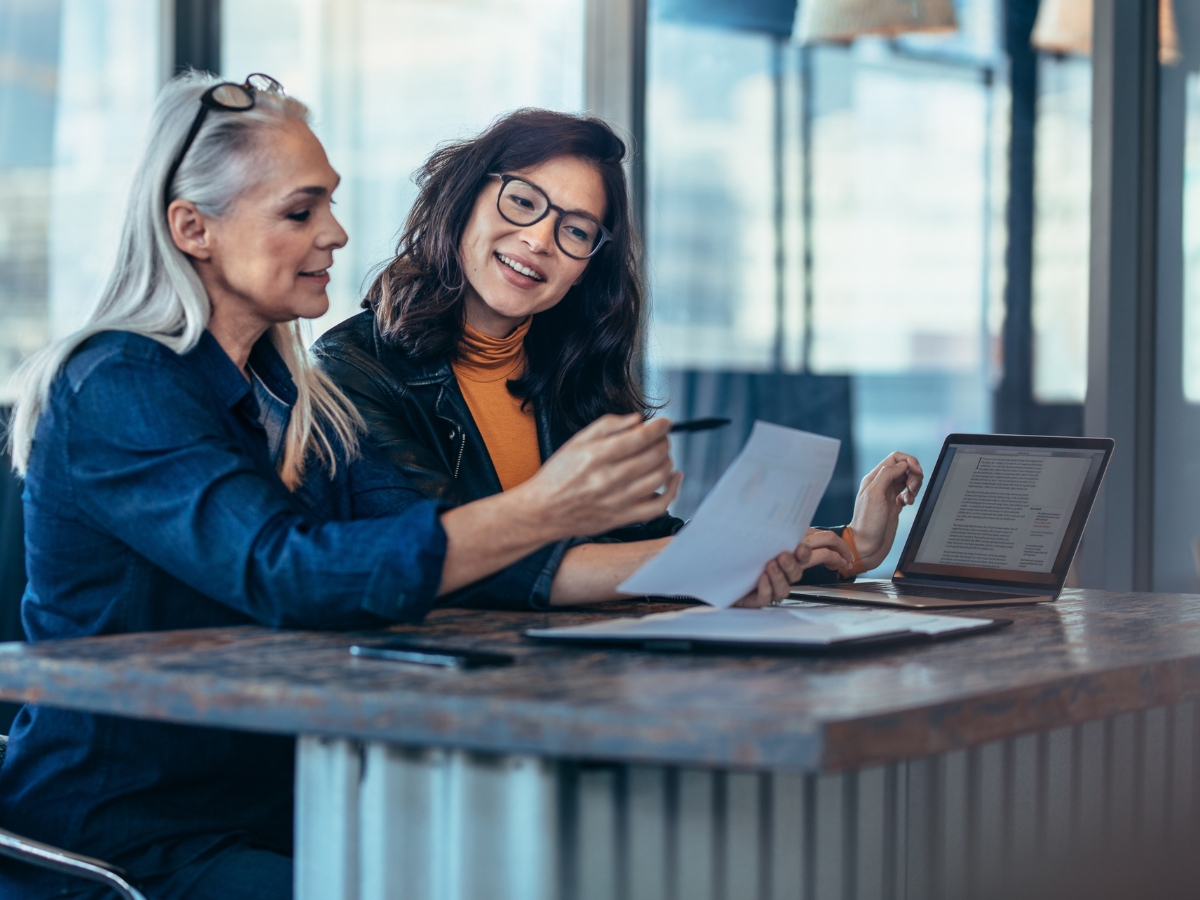 Two professionals in a supervision discussion